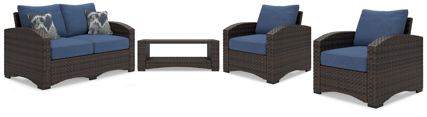 Windglow Outdoor Loveseat and 2 Chairs with Coffee Table