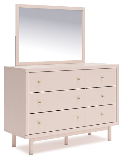 Wistenpine Full Upholstered Panel Bed with Mirrored Dresser